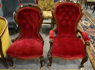 Lot 1401 - Two Victorian walnut bedroom chairs with button back red velvet upholstery