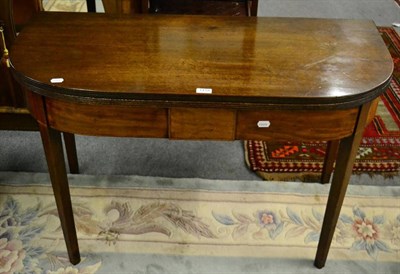 Lot 1418 - A mahogany D shaped fold over card table