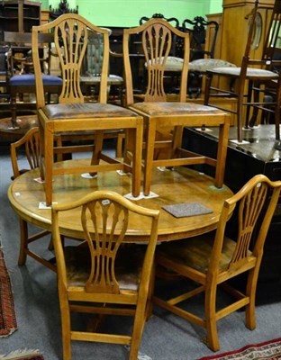 Lot 1426 - A breakfast table and six chairs