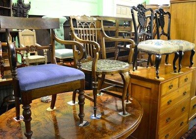 Lot 1434 - A marquetry inlaid armchair; a pair of ebonised nursing chairs and another armchair (4)