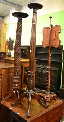 Lot 1444 - Two carved mahogany plant pedestals