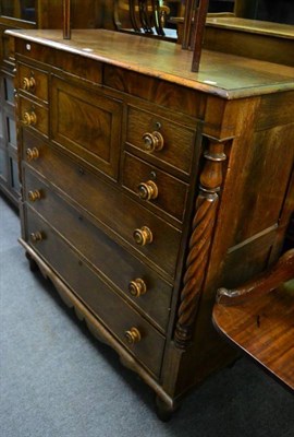 Lot 1445 - An oak and mahogany five height chest of drawers with central secret drawer