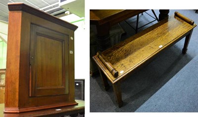 Lot 1450 - A late 19th century oak hall seat; and a small corner cupboard