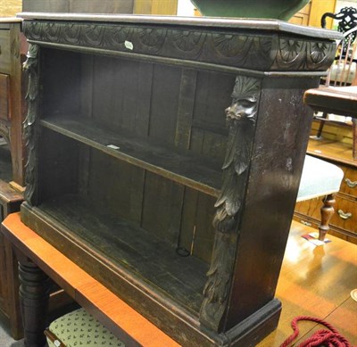 Lot 1452 - A Victorian carved oak dwarf bookcase; and an Art Nouveau two drawer oak chest