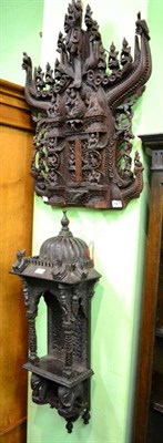 Lot 1461 - Two decorative Indian carved wooden wall hangings