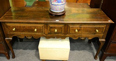 Lot 1484 - An 18th century oak three drawer dresser