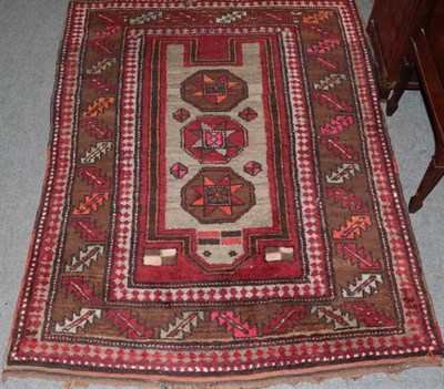 Lot 1500 - Kazak prayer rug, Central Caucasus, the steel grey field with three octagons beneath the...