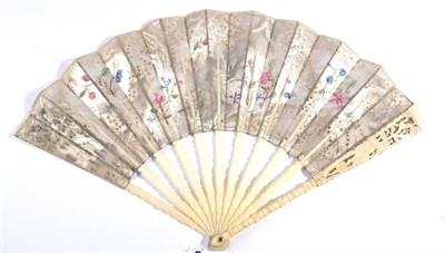 Lot 10 - A Mid-18th Century Fan in the Chinoiserie Style, découpé, the single paper leaf in silver and...