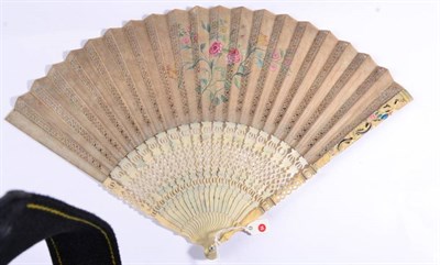 Lot 12 - An Early to Mid-18th Century Ivory Fan, with carved and pierced monture, the sticks slender,...