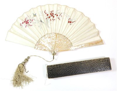 Lot 47 - A Dainty Early 20th Century Fan, the double embroidered cream silk leaf mounted on pink mother...