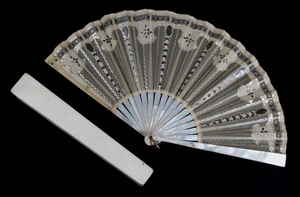 Lot 58 - An Early 20th White Mother-of-Pearl Fan, the gauze leaf mounted à l'Anglaise and applied with...