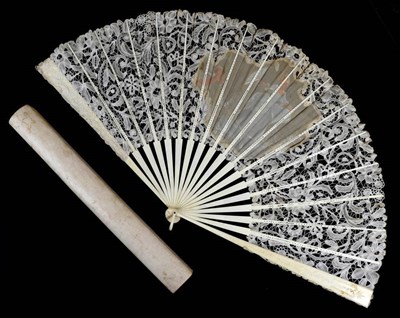 Lot 69 - A Large Late 19th Century Bone Fan, the monture lightly carved with delicate and mainly floral...