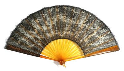 Lot 76 - A Late 19th Century Black Handmade Lace Fan Leaf, mounted on ''blonde tortoiseshell'' or resin...