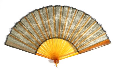 Lot 76 - A Late 19th Century Black Handmade Lace Fan Leaf, mounted on ''blonde tortoiseshell'' or resin...