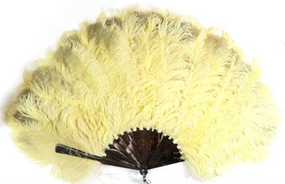 Lot 131 - The Duchess of Windsor: A Circa 1920's Fan, the pale yellow ostrich and grey marabou feathers...