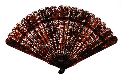 Lot 135 - A Circa 1840's Chinese Carved Tortoiseshell Brisé Fan, Qing Dynasty, with 19 inner sticks and...