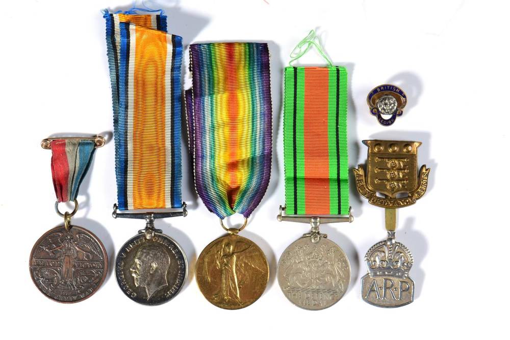 Lot 49 - A First/Second World War Group of Three Medals, awarded to 040583 PTE.C.W.DEMAIN, A.O.C.,...