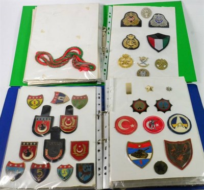 Lot 94 - A Collection of Badges and Insignia, including cap, collar, breast, rank and shoulder titles in...