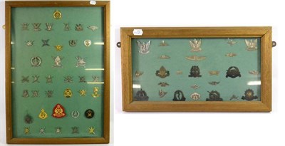 Lot 109 - A Collection of Thirty Seven Omani Military Cap Badges, loosely mounted on green baize in a...