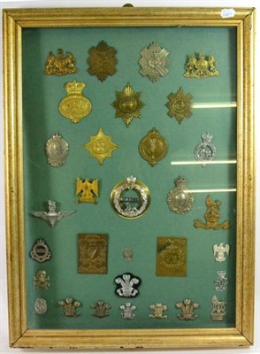 Lot 112 - A Display of Thirty One Badges, including glengarry badges to the Gordon Highlanders, plaid...