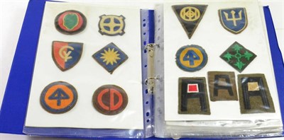 Lot 138 - A Collection of Seventy Nine US Army Appliqued and Embroidered Cloth Shoulder Sleeve Insignia, with
