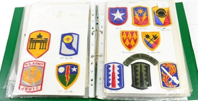 Lot 140 - A Collection of One Hundred and Sixty Four US Army  Embroidered Cloth Insignia, mainly shoulder...