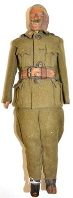 Lot 181 - A First World War Carved Wood Trench Art Figure, depicting a moustachioed military officer, in...