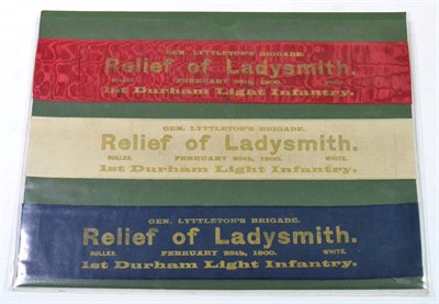 Lot 189 - A Very Scarce Boer War Trio of the Relief of Ladysmith Silk Armbands, each printed in gilt GEN....