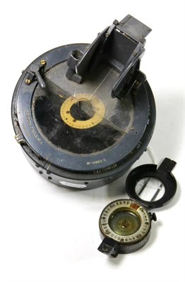 Lot 202 - A Second World War Pocket Compass by T G Co.Ltd., London, the back stamped MK.III, with broad...