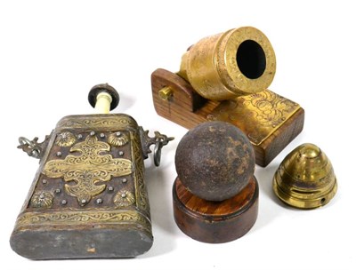Lot 222 - A Small Quantity of Militaria, comprising a Moroccan wood powder flask with foliate strapwork...
