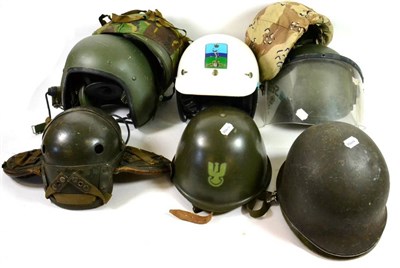Lot 227 - A Second World War US Tanker's Helmet, in green painted leather, with tan leather liner and...