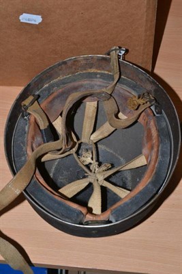Lot 228 - A Second World War British Airborne Paratrooper's Mk.2 Helmet, with black textured paint, the...