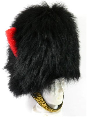Lot 231 - An Elizabeth II OR's Ceremonial Bearskin Hat to the Coldstream Guards, with scarlet horsehair...