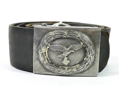 Lot 253 - A German Third Reich Luftwaffe EM/NCO's Belt and Buckle, the steel buckle with traces of...