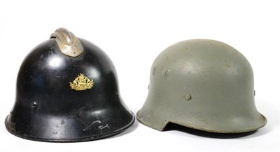 Lot 262 - A German Civic Square Dip Helmet, later painted light green, the left side with traces of hand...