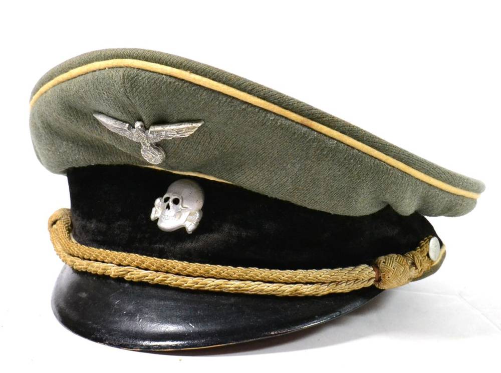 Lot 263 - A German Third Reich SS Officer's Peaked Cap, in field grey wool, with white waffenfarbe to the...