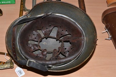 Lot 272 - A German Third Reich SS M35 Combat Helmet, with single decal, the original green paint now...