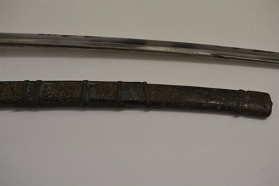 Lot 285 - A Shinto Japanese Tachi, the 77.5cm blade with broad undulating hamon, the one piece brass...