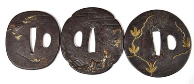 Lot 286 - A Japanese Iron Mokko Gata Tsuba, cast and applied in gold and silver with three scribes amidst...