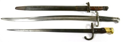 Lot 335 - A British 1856 Pattern Sword Bayonet, the fullered steel blade with War Department and...