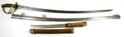 Lot 337 - A Cuirassier Type Sword, the 87.5cm single edge curved steel blade with a narrow fuller running...