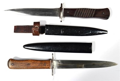 Lot 352 - A First World War German Fighting Knife, the 14.5cm single edge steel blade marked at the...