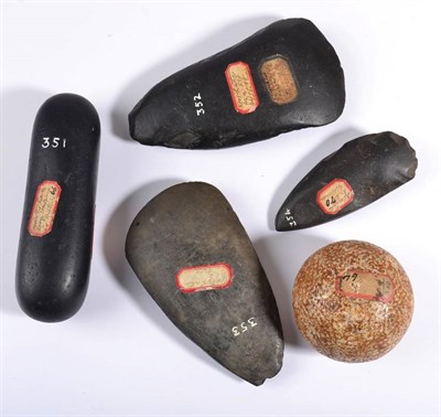 Lot 360 - A Collection of Neolithic Late Celt Artefacts, comprising: a circular hammer stone, numbered,...