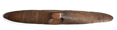 Lot 363 - An Australian Aborigine Parrying Shield, of dense hard wood, the elliptical convex fascia stone...