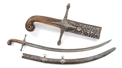 Lot 380 - A Late 18th Century Persian Shamshir, the 75cm single edge curved steel blade with a broad...