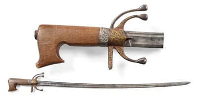 Lot 387 - An 18th Century Moroccan Nimcha (Mahratta Sabre), each side of the 87cm single edge steel blade...