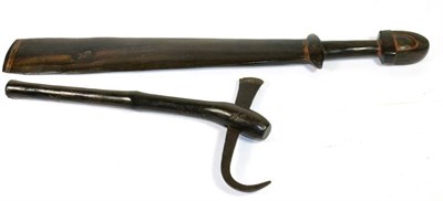 Lot 402 - A Massim, Trobriand Islands Dark Hardwood Sword Club, with 51cm spatula type head, cylindrical grip