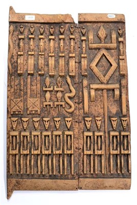 Lot 408 - A Dogon Two Panel Granary Door, Mali, relief carved with rows of figures, lizards and snakes,...