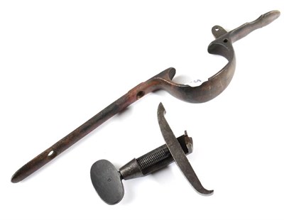 Lot 425 - A Continental Mainspring Clamp for a Military Rifle and a Brass Trigger Guard for a Brown Bess (2)