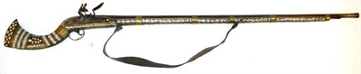 Lot 470 - An Early 19th Century Afghan Flintlock Jezail, the 124cm steel barrel with swamped muzzle, with...